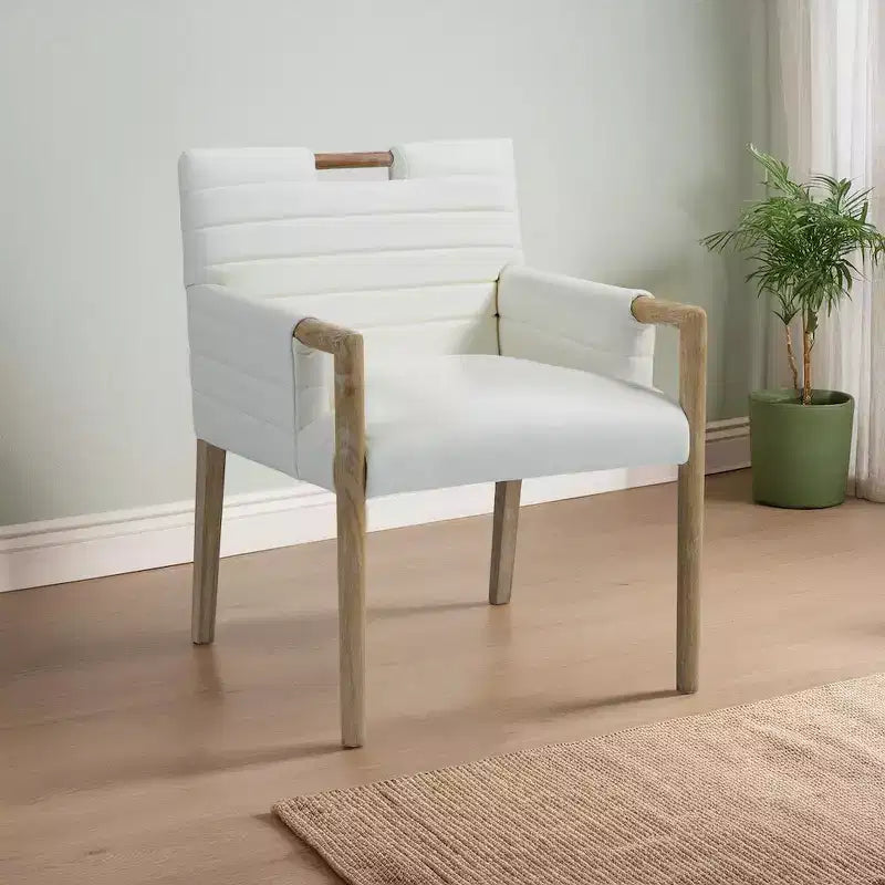 Sedia da pranzo Aimee con braccioli in pelle vegana, poltrona moderna imbottita, nera