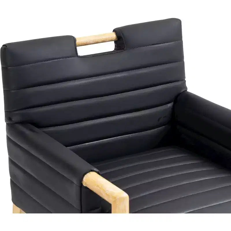 Sedia da pranzo Aimee con braccioli in pelle vegana, poltrona moderna imbottita, nera